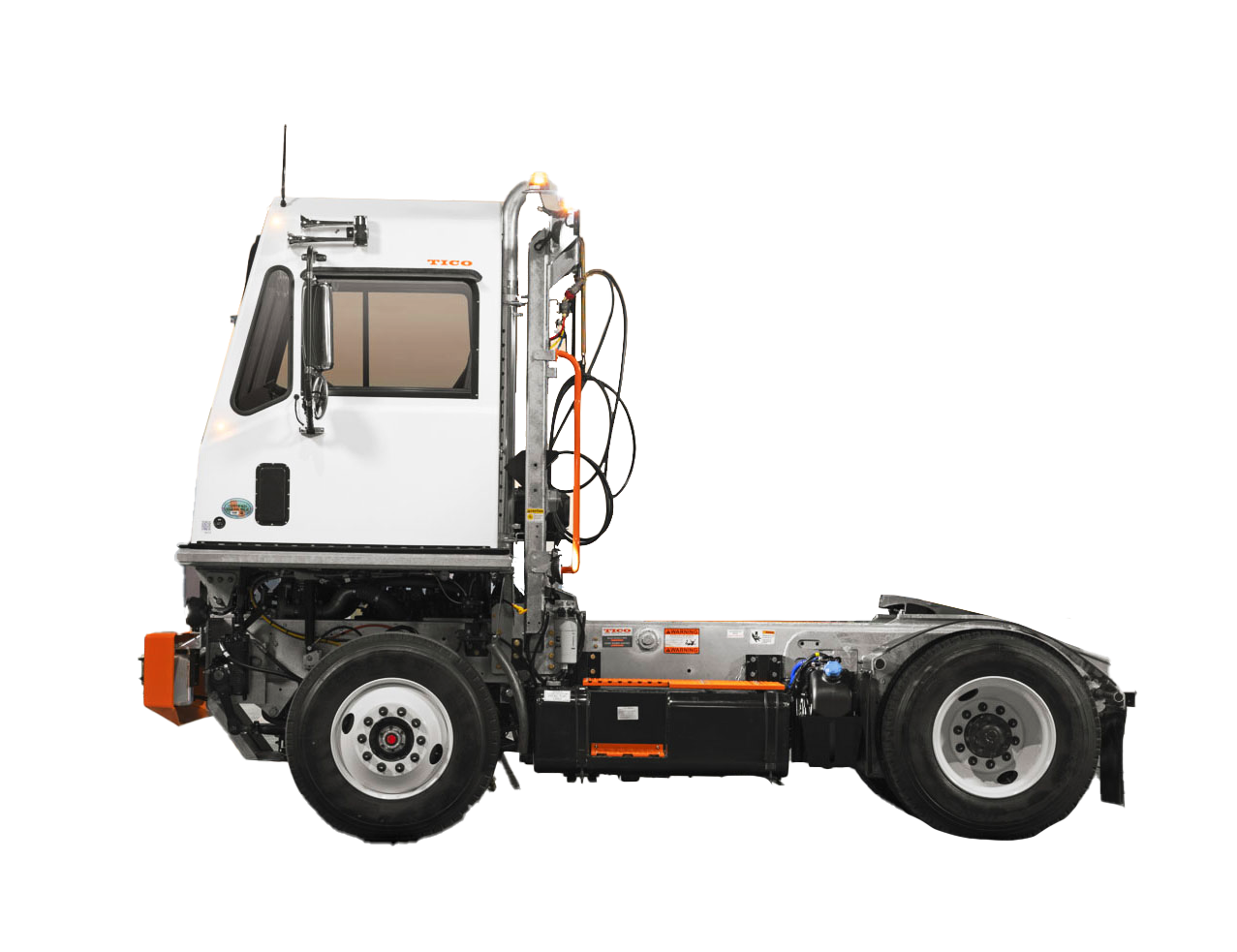 Side view of a white terminal tractor, built for moving trailers efficiently around yards and distribution centers.