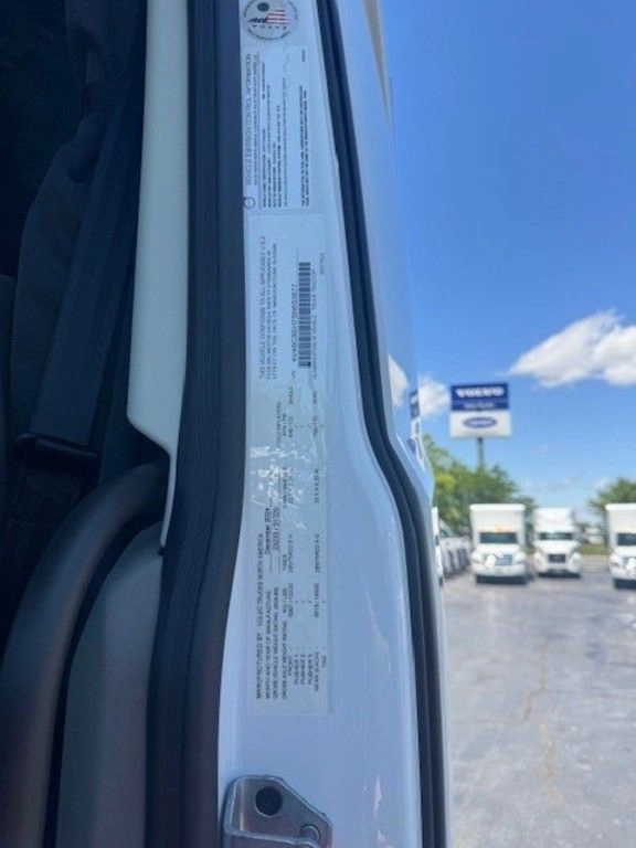 Close-up of the Volvo VNL660 door jamb label with vehicle information and compliance details.