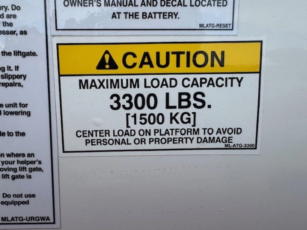 Caution label states the Hino L6 liftgate has a maximum load capacity of 3,300 pounds.