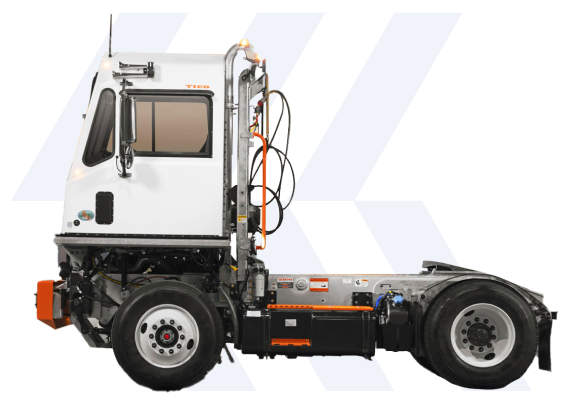 White TICO terminal tractor shown from the side with cab, chassis and rear wheel visible.